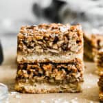This easy Pecan Pie Bars recipe is your favorite pie but easier to make with a shortbread crust and perfect for sharing!