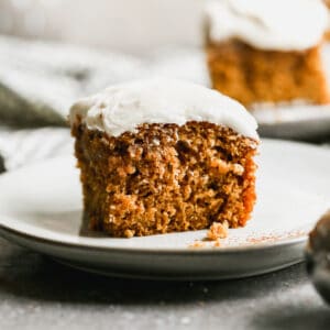 A square thumbnail image of a homemade Pumpkin Cake with cream cheese frosting.