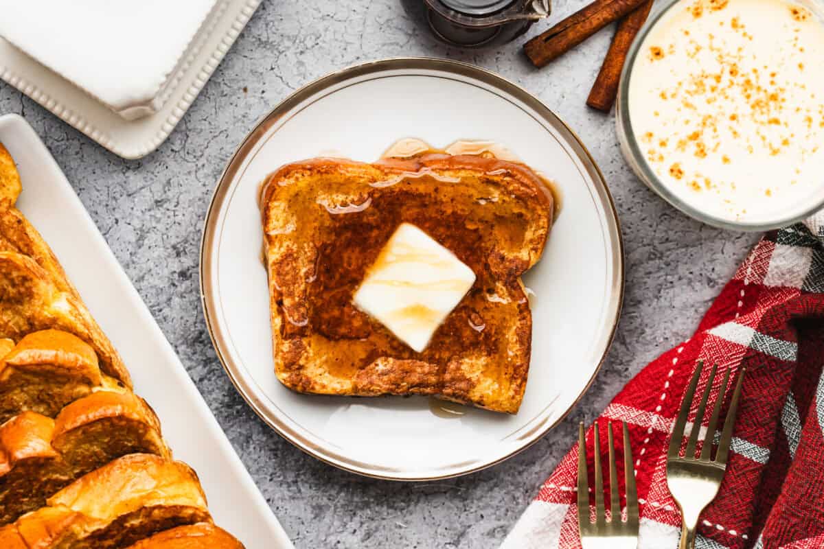This easy Eggnog French Toast recipe has all the spiced eggnog flavor in our favorite breakfast classic.