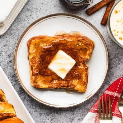 This easy Eggnog French Toast recipe has all the spiced eggnog flavor in our favorite breakfast classic.