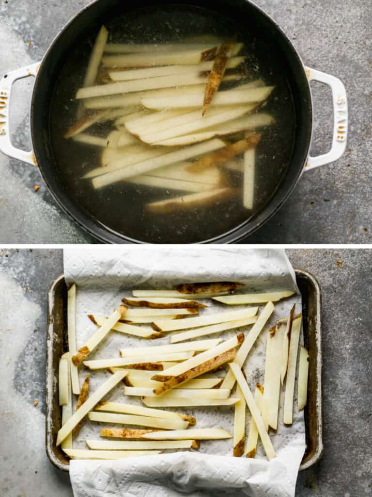 Cut russet potatoes soaking in hot water, then drying on a baking sheet, ready to make French fries.