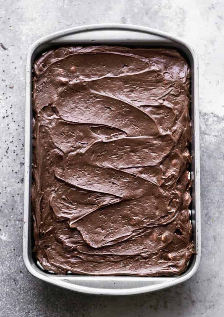 A pan of brownies frosted with chocolate frosting.