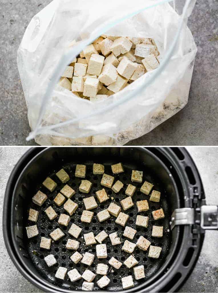 Chopped tofu pieces mixed with cornstarch and seasonings in a bag, then added to an air fryer.