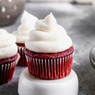Cream Cheese Frosting on a red velvet cupcake.