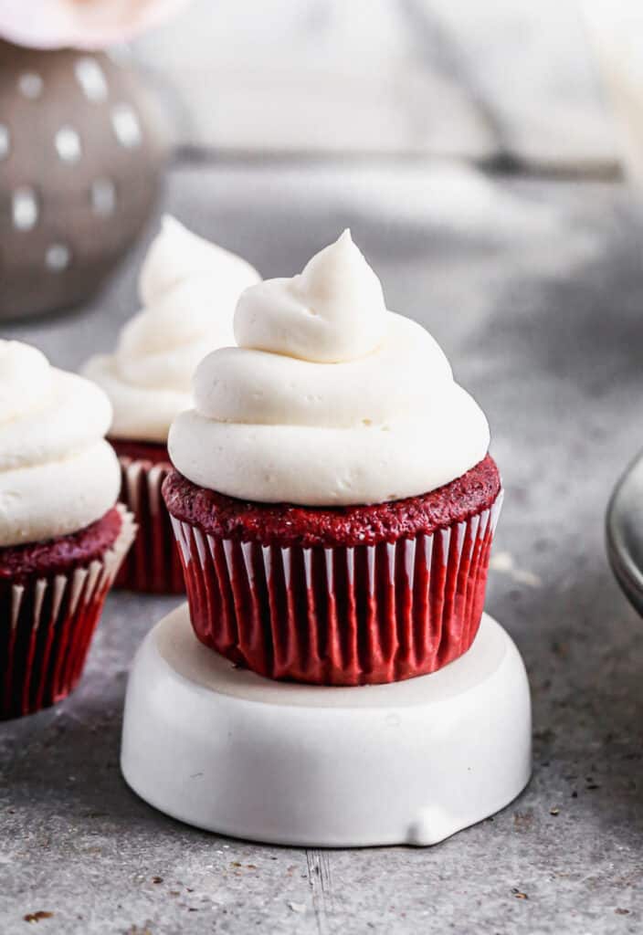 Homemade Cream Cheese Frosting on a red velvet cupcake.
