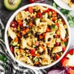 This cheese Tortellini Pasta Salad recipe is flavorful and packed with fresh ingredients and only takes 30 minutes to make!
