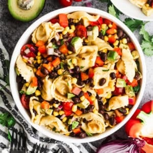This cheese Tortellini Pasta Salad recipe is flavorful and packed with fresh ingredients and only takes 30 minutes to make!