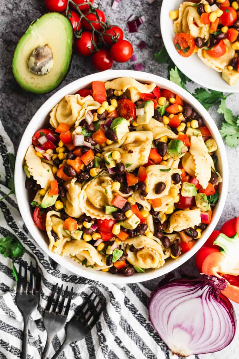 This cheese Tortellini Pasta Salad recipe is flavorful and packed with fresh ingredients and only takes 30 minutes to make!