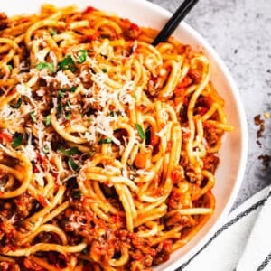 The best Instant Pot Spaghetti has a homemade meat sauce and cooks the noodles perfectly! It's the easiest weeknight meal ready in under 30 minutes!