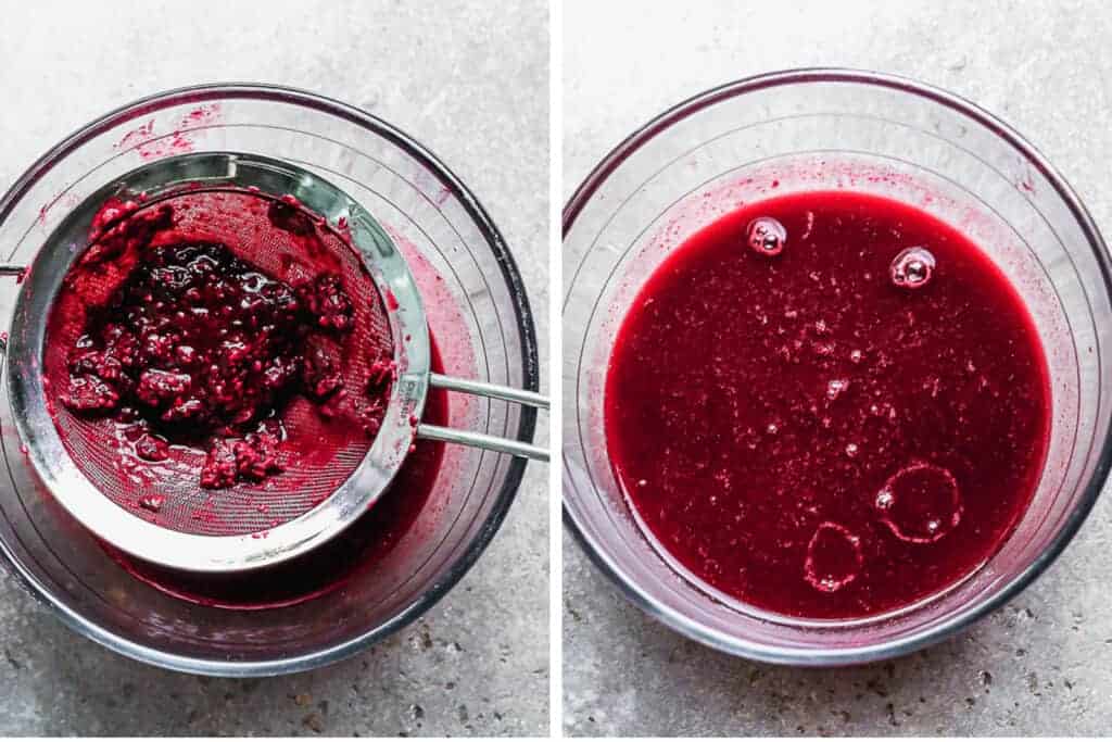 Mashed blackberry mixture being pushed through a fine mesh sieve to remove seeds.