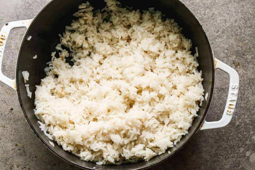 Cooked coconut rice in a pot.
