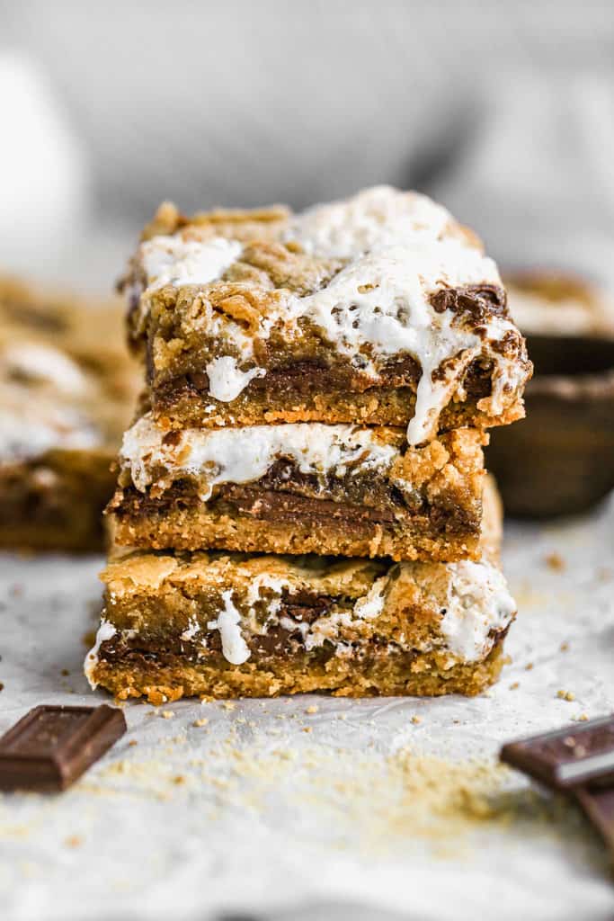 Three s'mores bars stacked on each other.