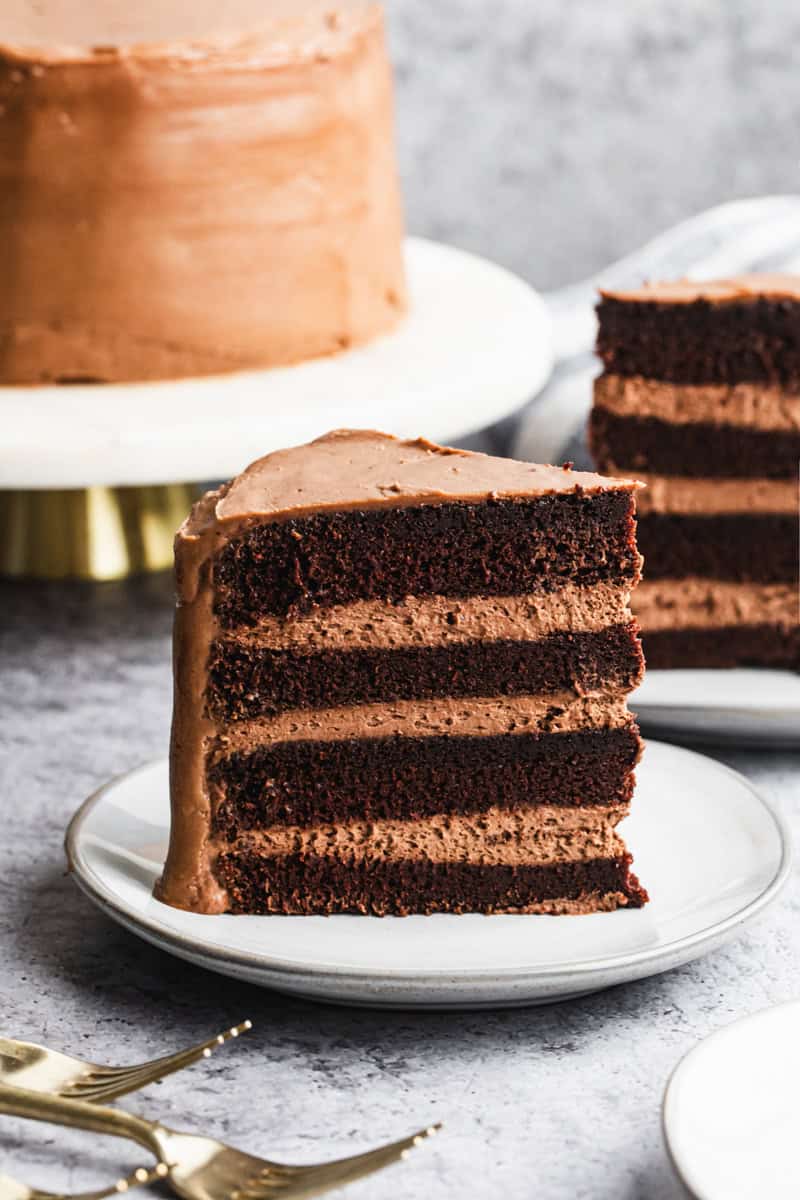 This easy Chocolate Mousse cake has layers of moist chocolate cake and a creamy homemade chocolate mousse, topped with a smooth chocolate frosting. It's elegant, delicious, and perfect for any occasion!