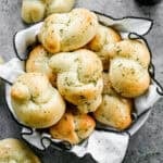 This homemade Garlic Knots recipe is soft, fluffy, and brushed with a delicious garlic butter. It's easy to make with pantry staples and disappears in minutes!