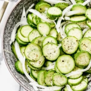 This easy Cucumber Onion Salad couldn't be easier and quicker to make, but it tastes so refreshing and goes with every main dish!