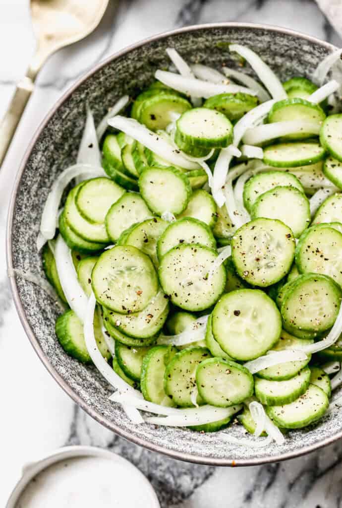 This easy Cucumber Onion Salad couldn't be easier and quicker to make, but it tastes so refreshing and goes with every main dish!