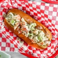 This easy Lobster Roll recipe has warm lobster tossed in a light sauce and served on a toasted bun. It's easier to make than you think and is worth every minute of prep!