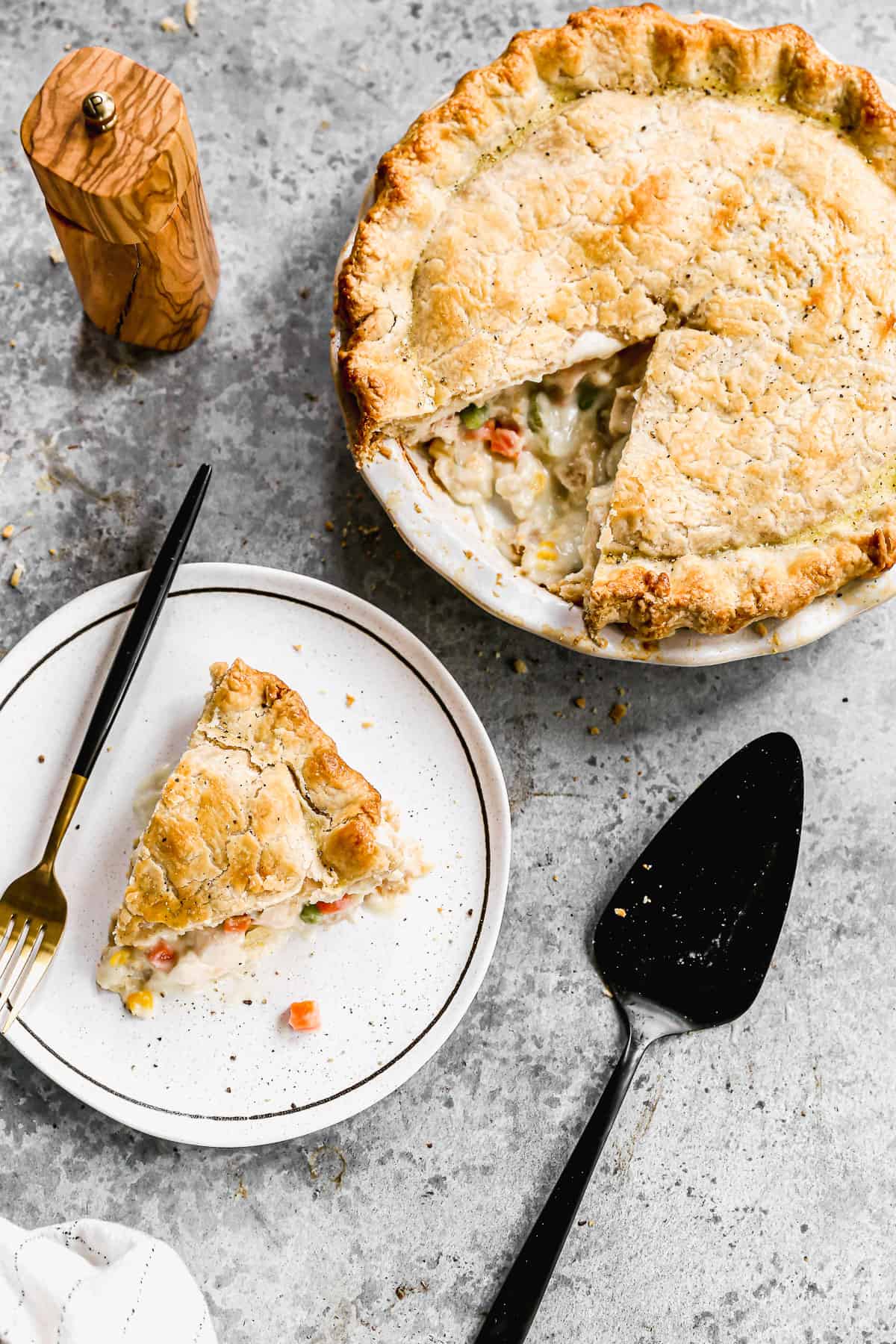 Easy Chicken Pot Pie with one slice placed on a plate. 