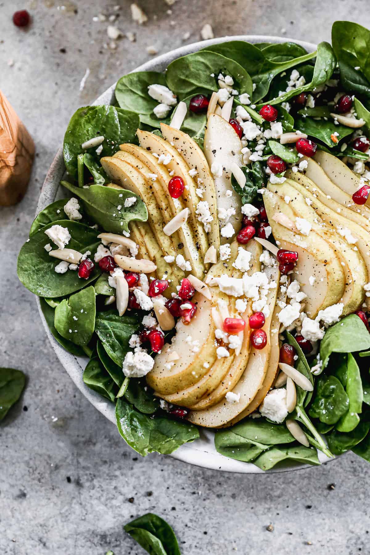 A close-up image of easy Pear and Pomegranate Salad, ready to eat.