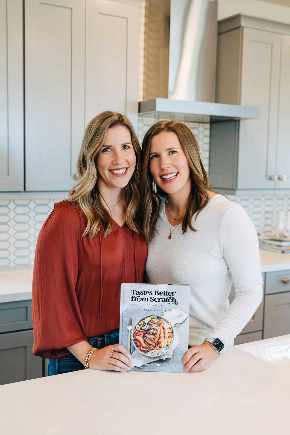 Liz and Lauren and the TBFS cookbook