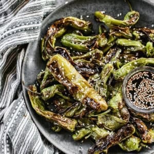 The best Blistered Shishito Peppers recipe is sweet, spicy, and the most impressive appetizer you can make in 10 minutes!