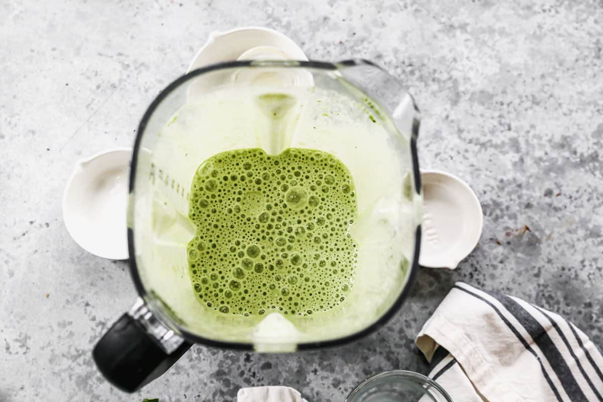 A fresh Green Smoothie in a blender, ready to pour and enjoy. 