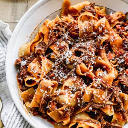 This short rib ragu recipe is restaurant-quality and so flavorful! It's easy to make and absolutely delicious!
