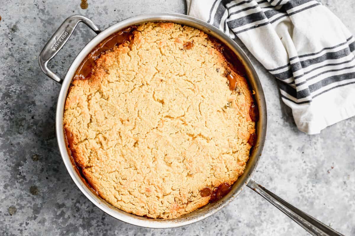 Baked Tamale Pie in a stainless steel pan, fresh out of the oven.