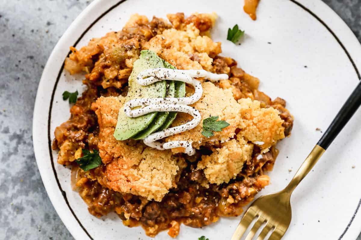 This easy Tamale Pie recipe has all the flavors we love from tamales without all of the work! It is simple and comes together quick all in one pan!