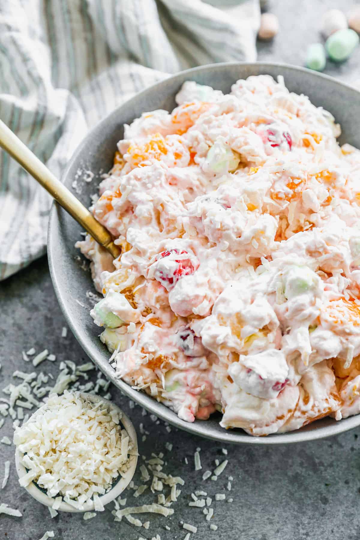A close up image of Ambrosia salad in a large serving bowl, ready to enjoy.