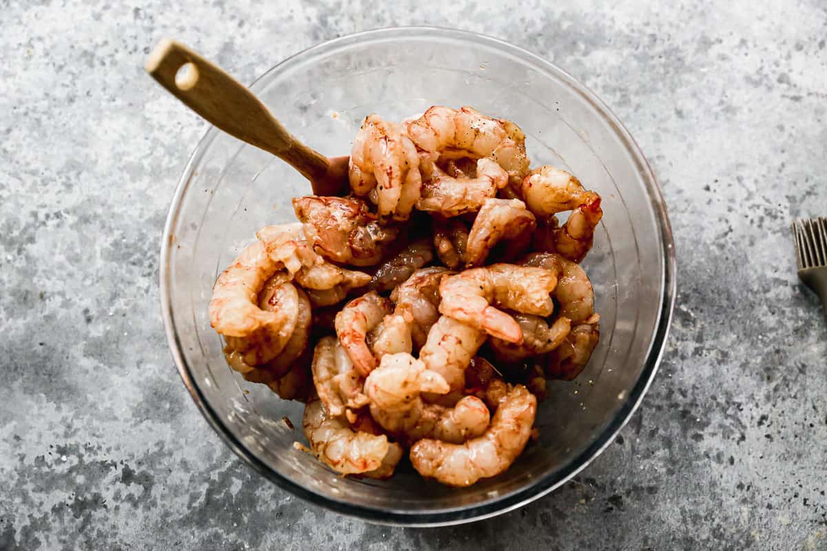 Shrimp marinating in a sauce made from soy sauce, black pepper, and cornstarch for Kung Pao Shrimp.