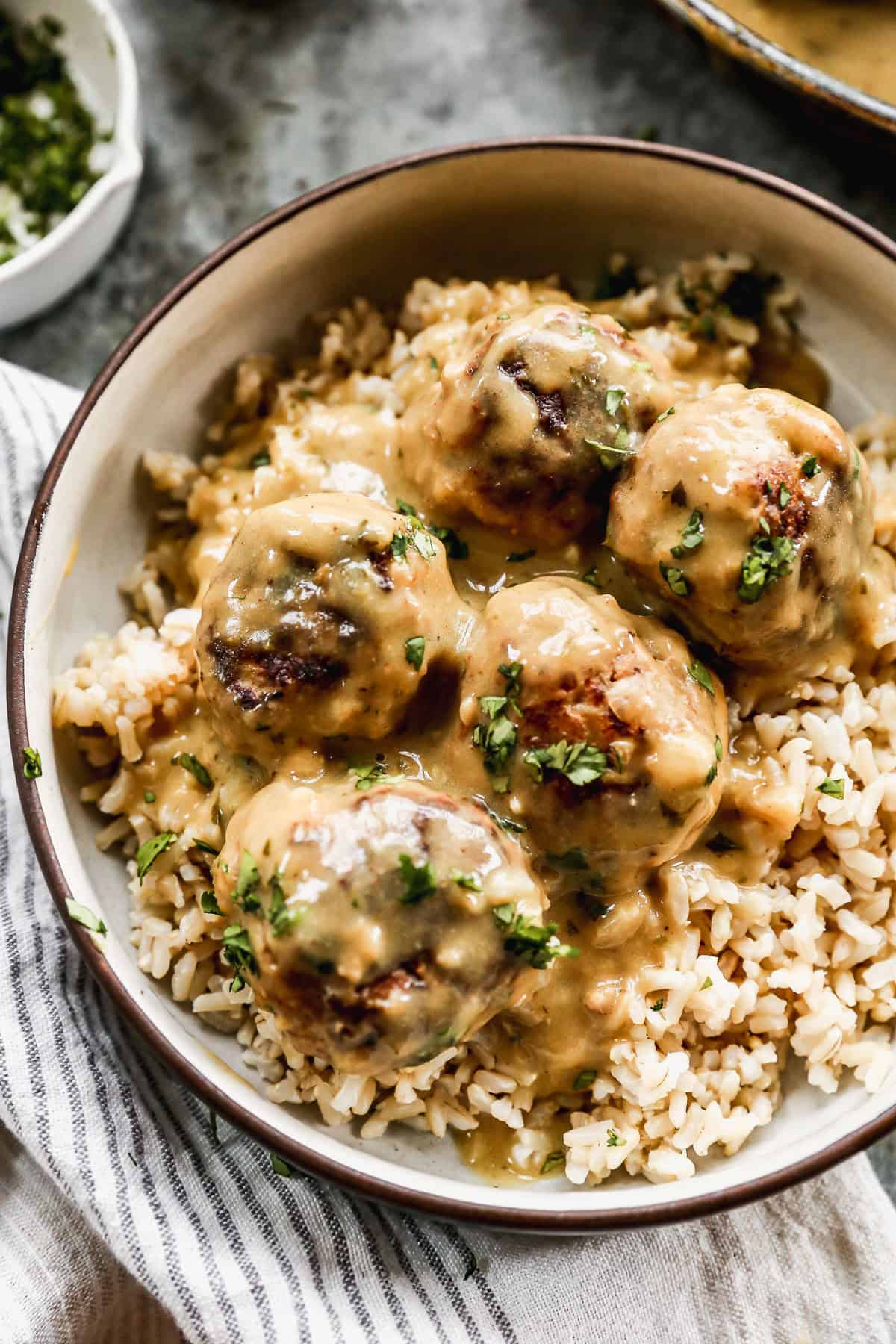 These Thai-inspired Green Curry Meatballs are easy to make and have the most incredible green curry sauce. These Thai Meatballs are made in just 30 minutes and absolutely delicious!