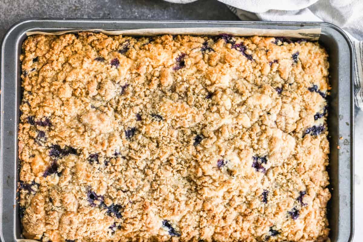A homemade blueberry coffee cake recipe fresh out of the oven and ready to serve.