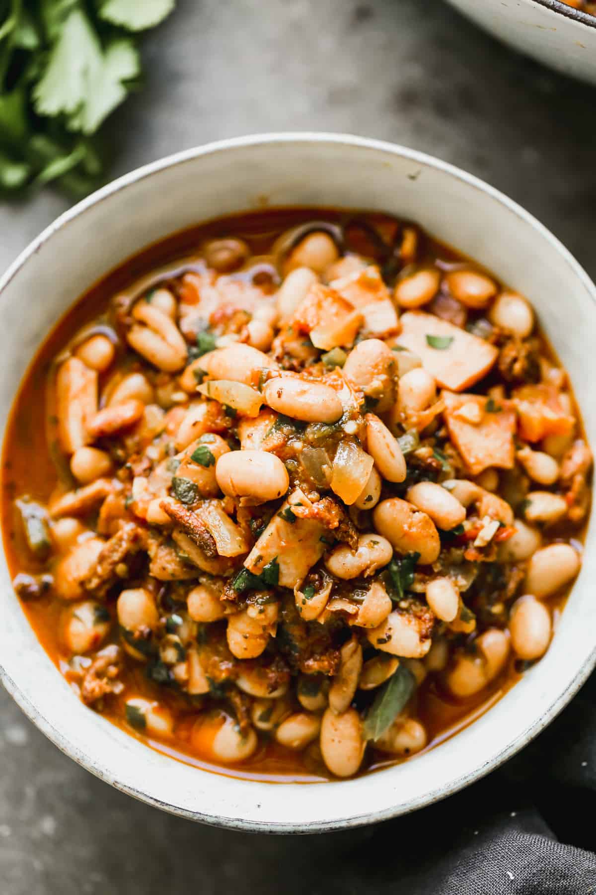 A bowl full of Borracho Beans, warm and ready to eat.