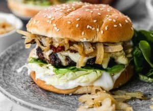 This easy French Onion Burgers recipe uses onion soup mix to make the most flavorful burgers that will rival any restaurant! Made with fresh, high quality ingredients, this is a recipe you need to add to your burger rotation!