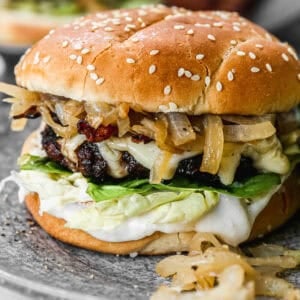 This easy French Onion Burgers recipe uses onion soup mix to make the most flavorful burgers that will rival any restaurant! Made with fresh, high quality ingredients, this is a recipe you need to add to your burger rotation!