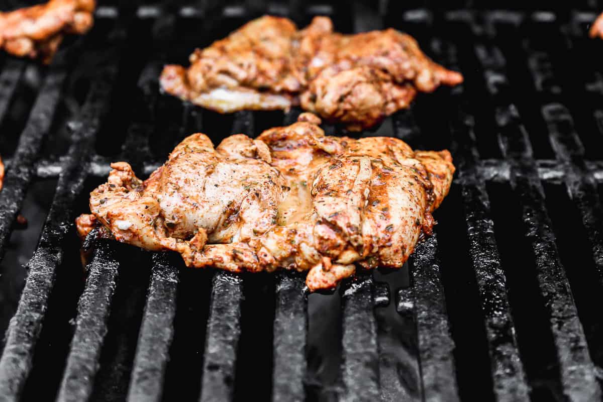 Chicken thighs on the grill for homemade street tacos.