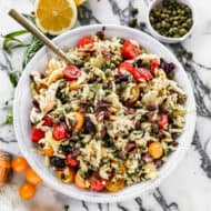 Mediterranean Orzo Salad in a large serving bowl, ready to serve.