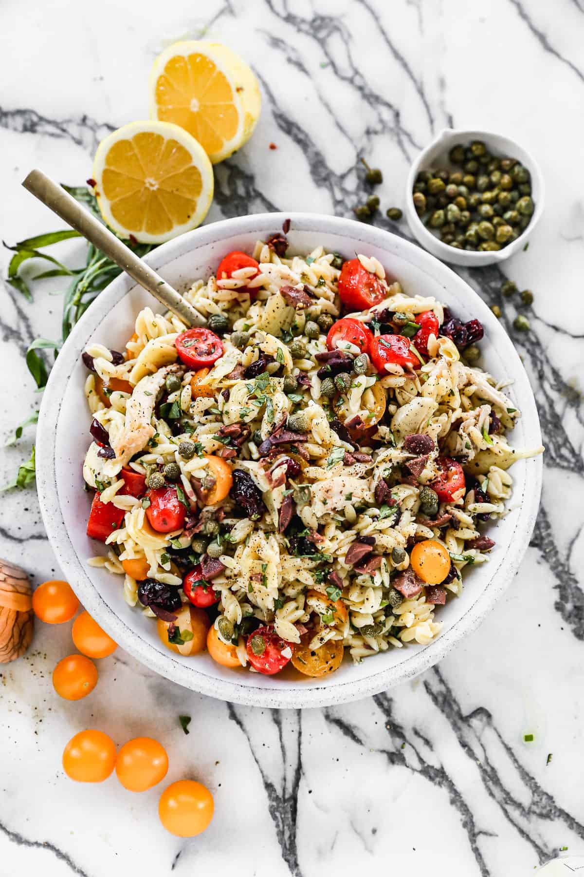 Mediterranean Orzo Salad in a large serving bowl, ready to serve.