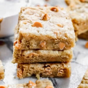 These Butterscotch Bars are chewy and delicious with butterscotch chips throughout. They cook perfectly in one pan and are ready in just 35 minutes!