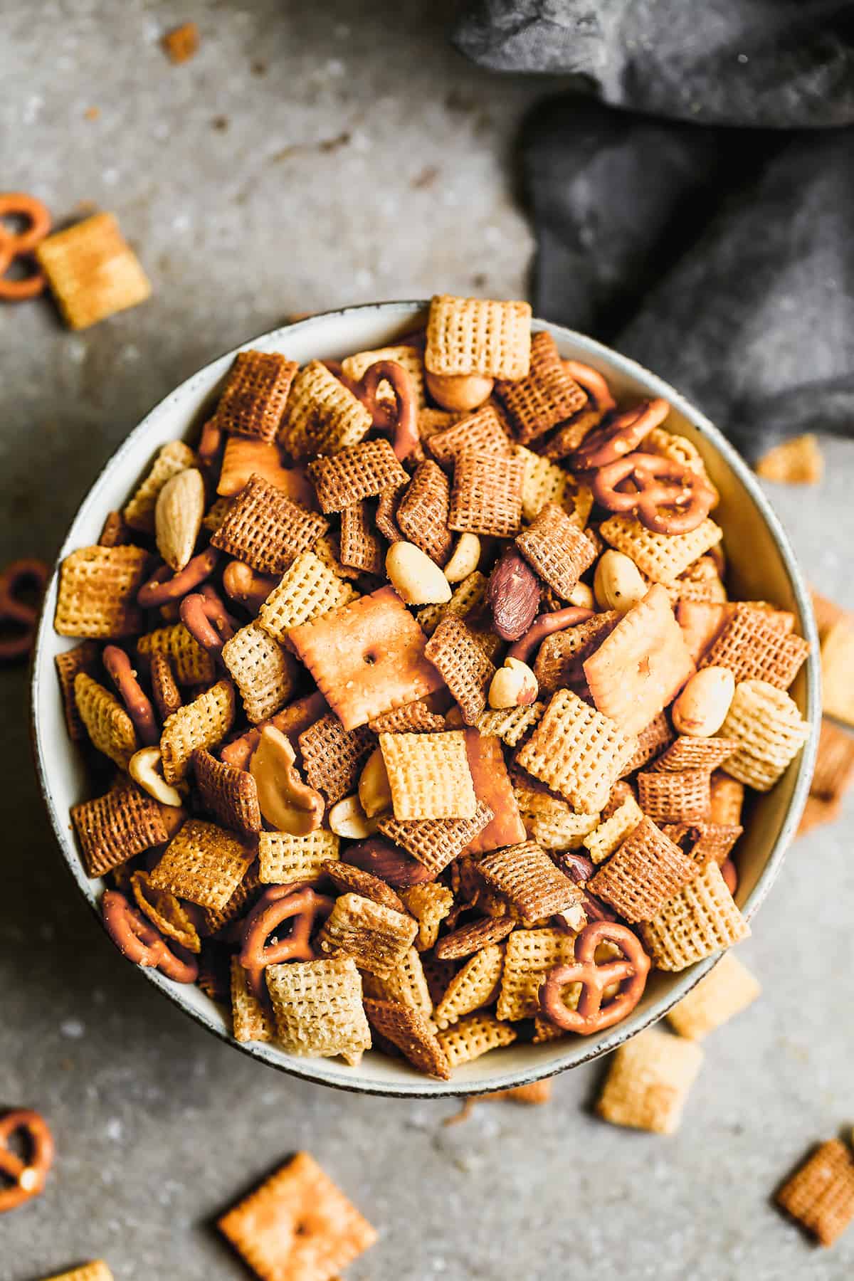 A bowl of homemade Chex Mix ready to take to a party and share.