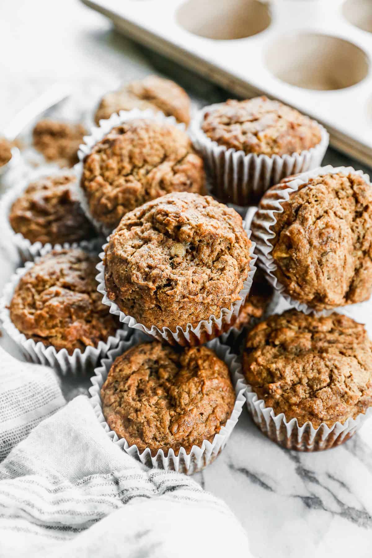 A pile of Healthy Banana Muffins, ready to enjoy.