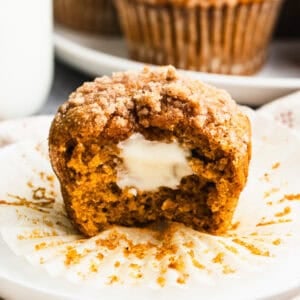 These easy Pumpkin Cream Cheese Muffins recipe is moist and perfectly spiced with a cream cheese filling and a crunchy streusel topping.
