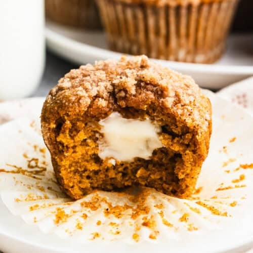 These easy Pumpkin Cream Cheese Muffins recipe is moist and perfectly spiced with a cream cheese filling and a crunchy streusel topping.
