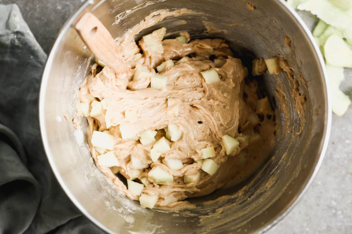 Easy Apple Coffee Cake batter in a stainless steel mixing bowl.