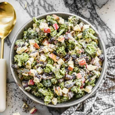 A bowl of an easy Broccoli Apple Salad recipe, ready to serve.