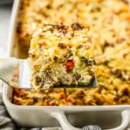 Hashbrown Breakfast Casserole with a slice being removed from the pan.