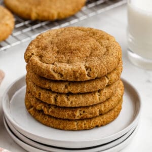 A stack of Pumpkin Snickerdoodle cookies on a white plate.