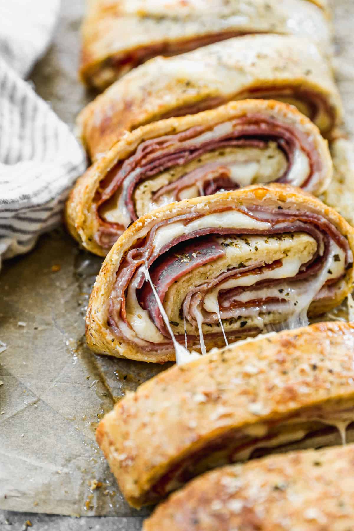 A pepperoni stromboli recipe sliced and ready to be enjoyed.