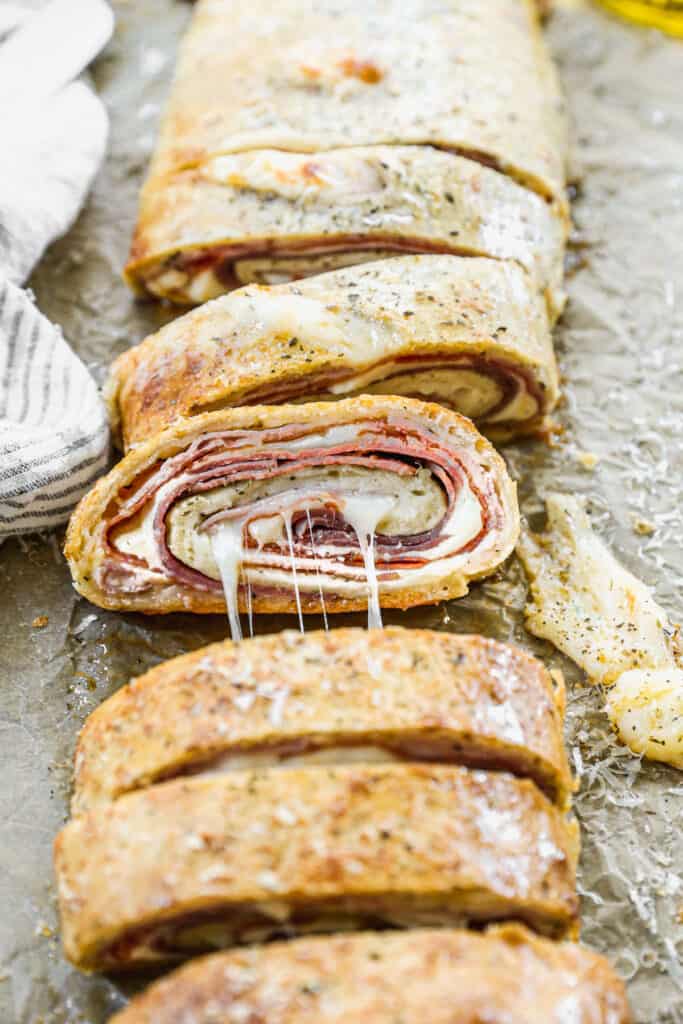 An easy Stromboli recipe, sliced to show the layers inside.